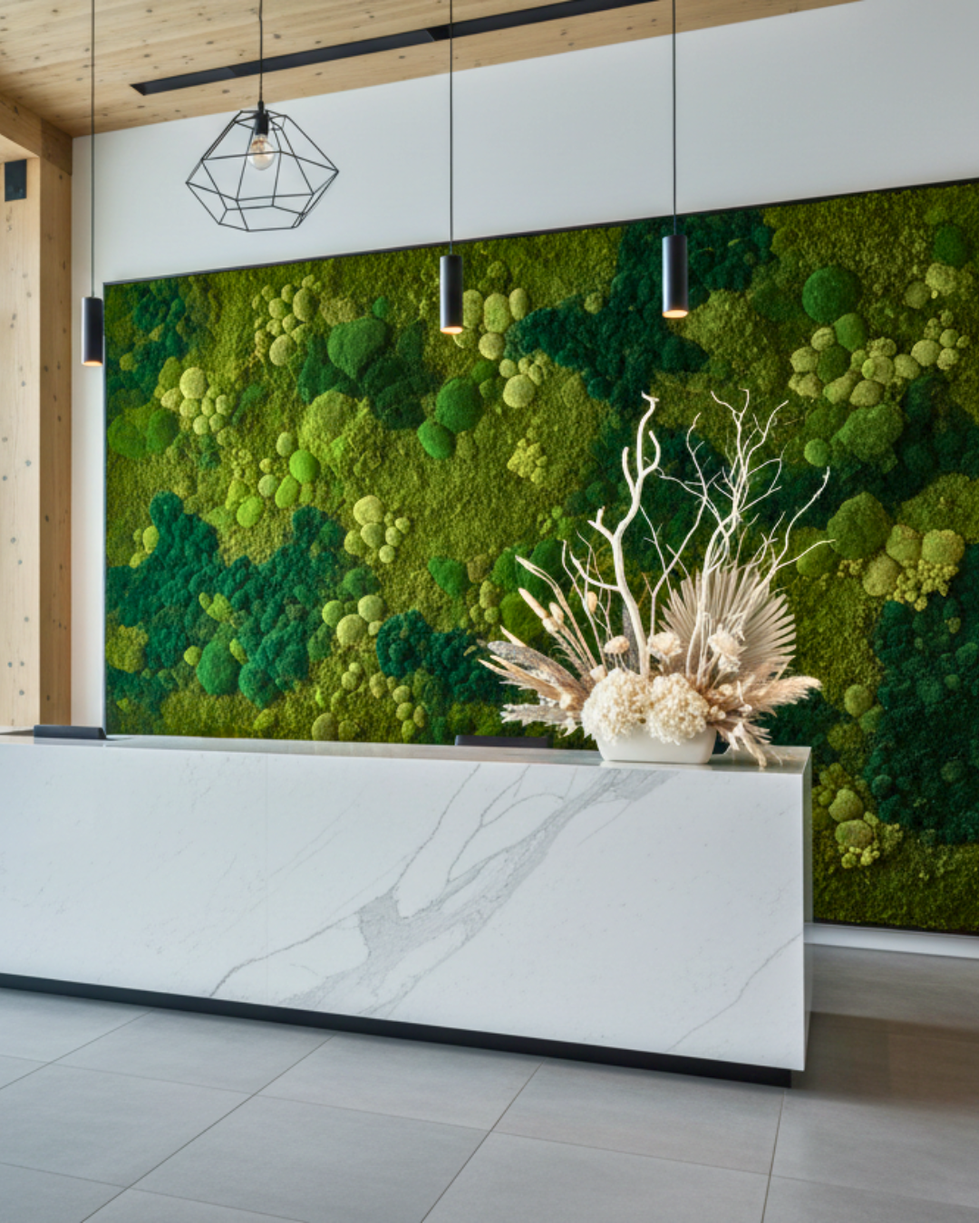 Modern interior with a green moss wall and decorative plant | Fleur Reverie | Austin TX
