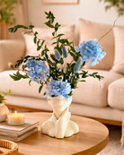 Decorative vase with blue preserved flowers on a wooden table | Fleur Reverie | Austin TX