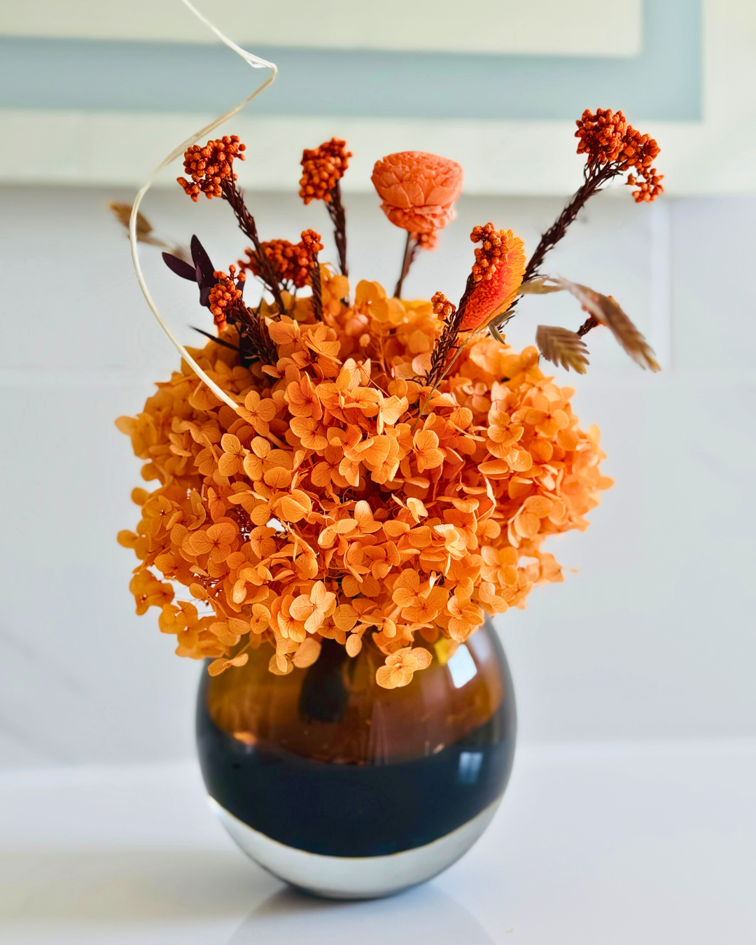 Orange transient Vase with orange preserved hydrangeas | Fleur Reverie