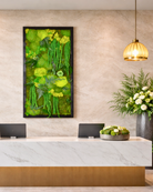 Living moss wall art in a Modern interior with a reception desk, decorative plants | Fleur Reverie | USA