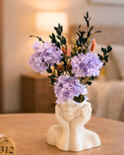 Decorative vase with purple preserved flowers on a wooden surface | Fleur Reverie | Austin TX