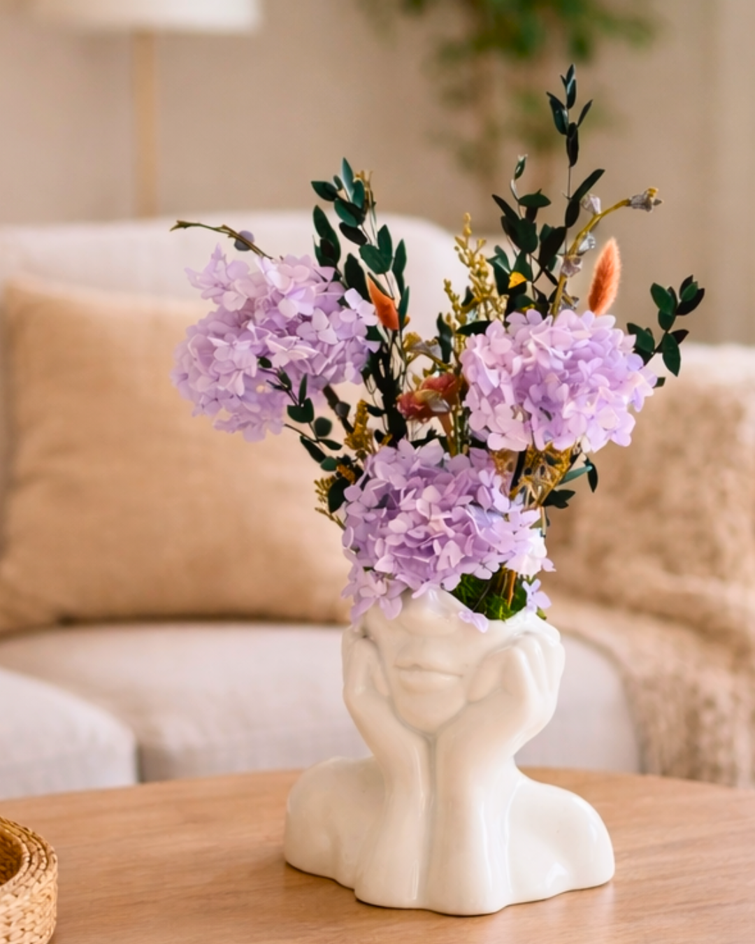 Decorative vase with purple preserved flowers on a wooden table in a living room | Fleur Reverie | Austin TX