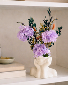 Decorative vase with preserved purple flowers on a shelf | Fleur Reverie | Austin TX