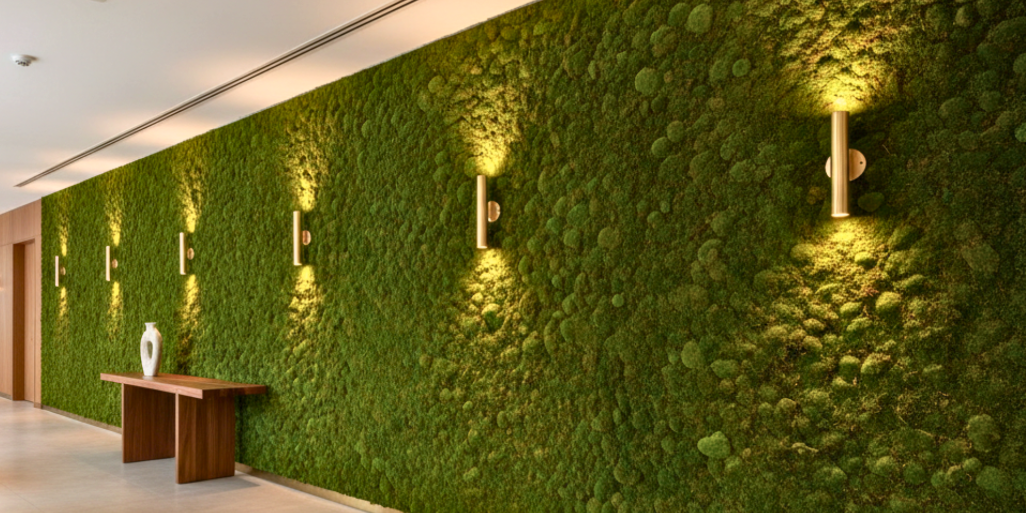 AxioMoss™ wall with a table and small vase in cozy lights | Fleur Reverie