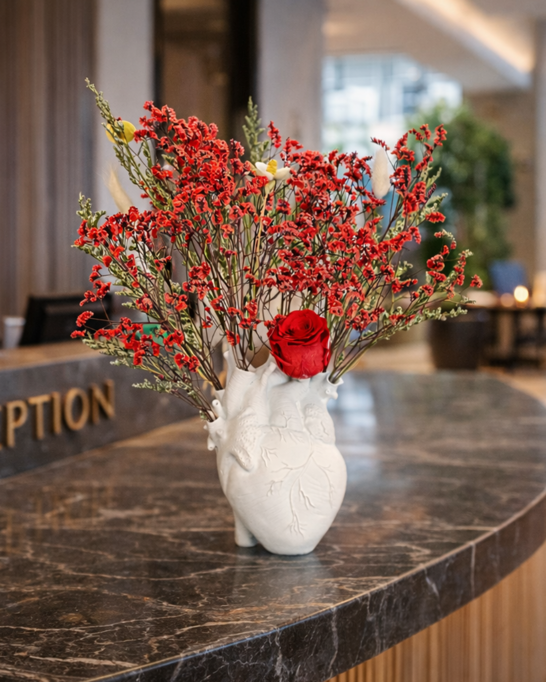 Decorative red dried floral arrangement in a white vase |Fleur Reverie | Austin TX