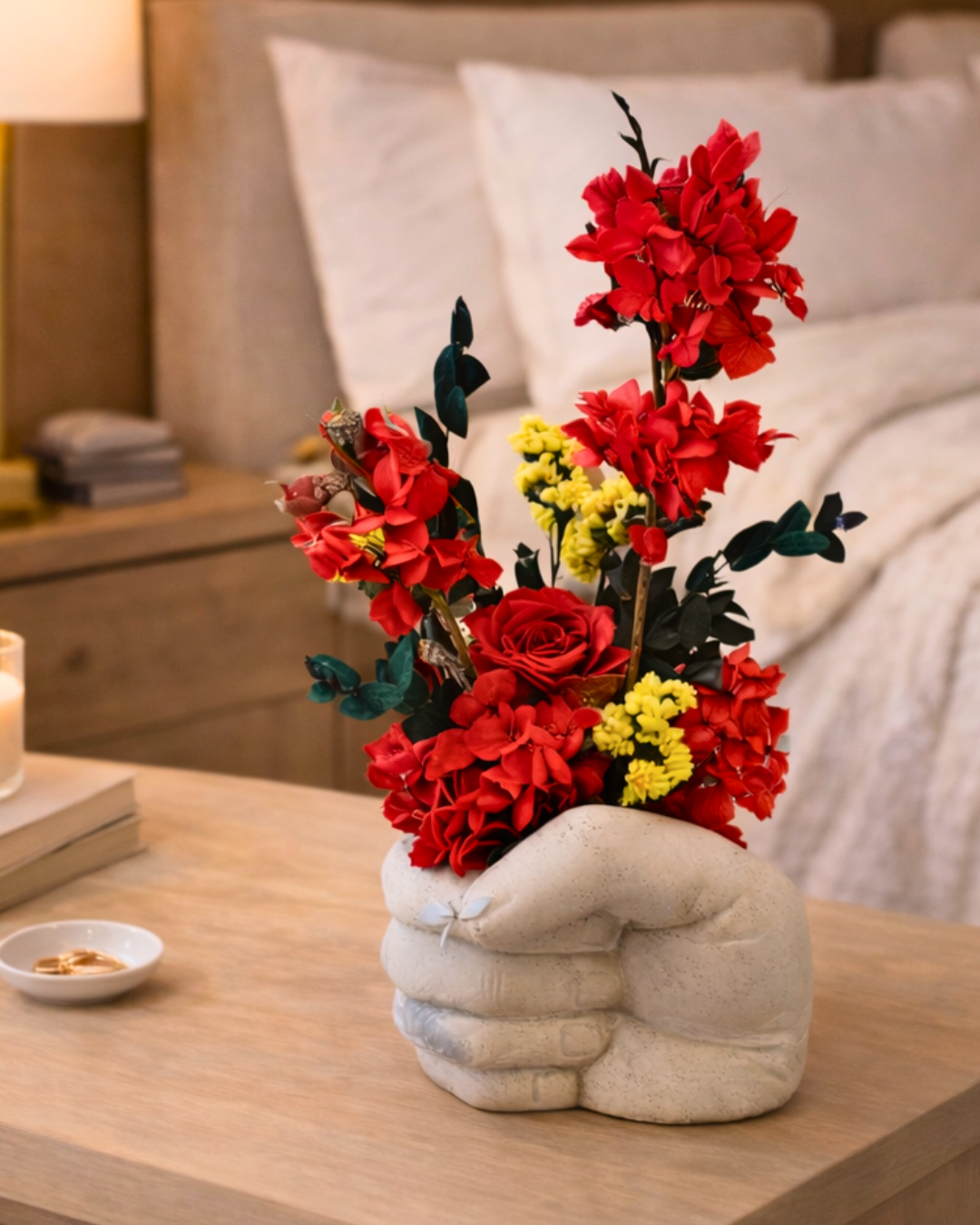 Decorative vase with red and yellow preserved flowers and rose in a hand shaped concrete vase | Fleur Reverie