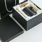 A black coffee mug tea cup in a luxury gift box with wooden handle and cap, made by 50 shades of greed